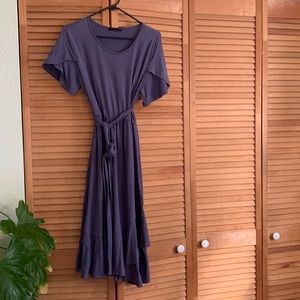 Lavender summer dress.  Fit and flair with loose sleeve and fun ruffled bottom.